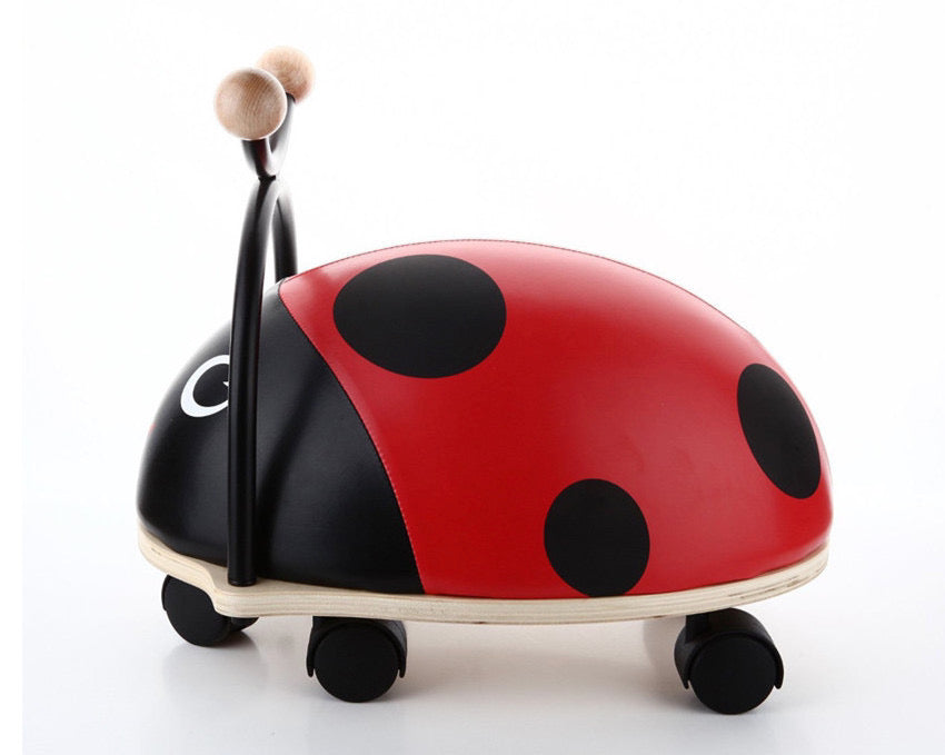 Wooden ladybird deals ride on